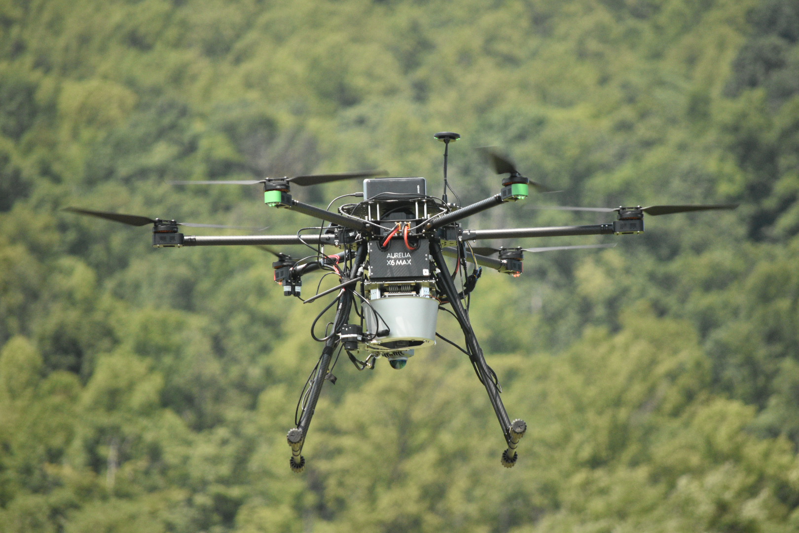 VISTA hexarotor flying over the field with thermal, hyperspectral, and LiDAR sensors